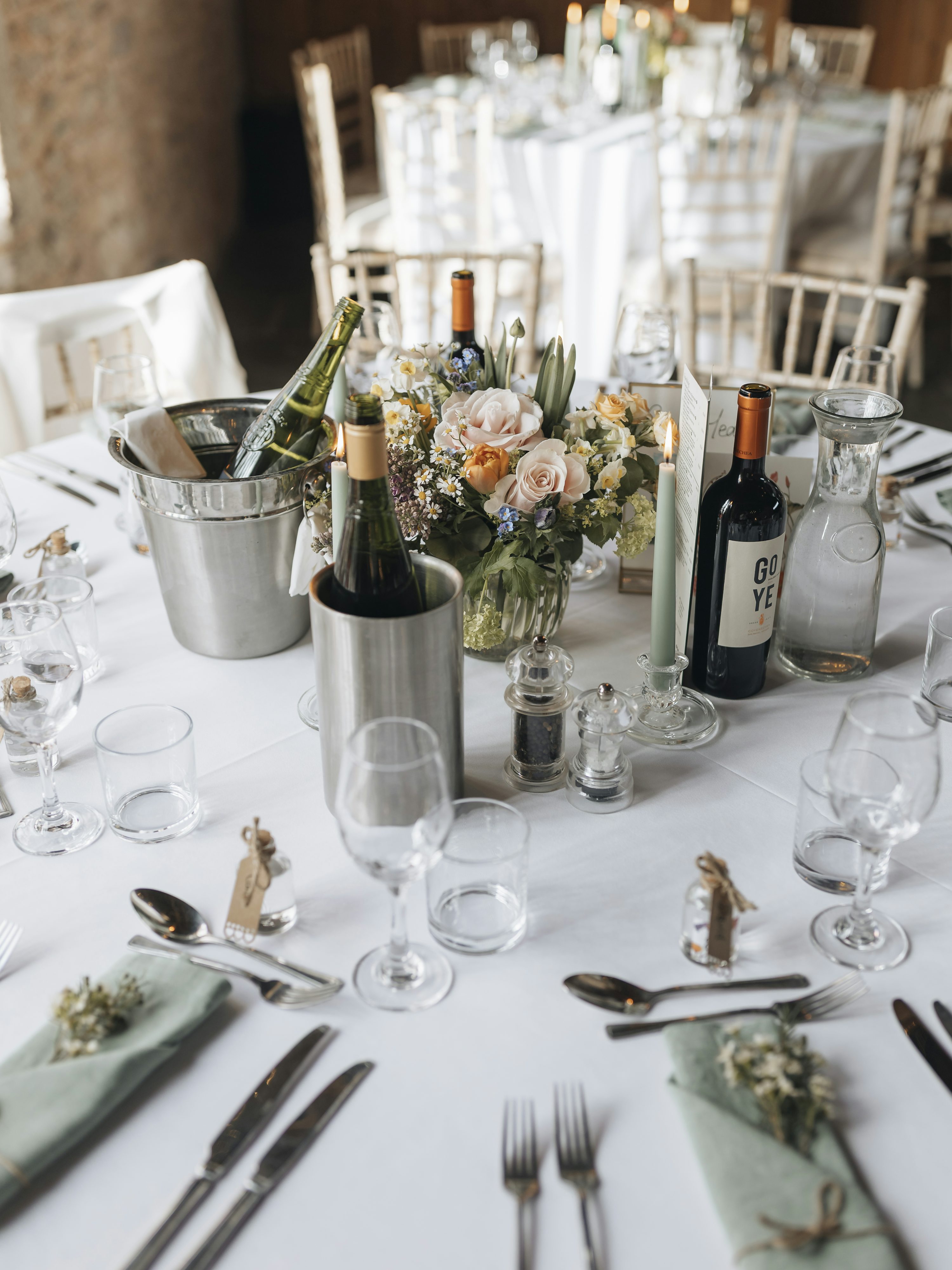 Roses and candles at the wedding table
