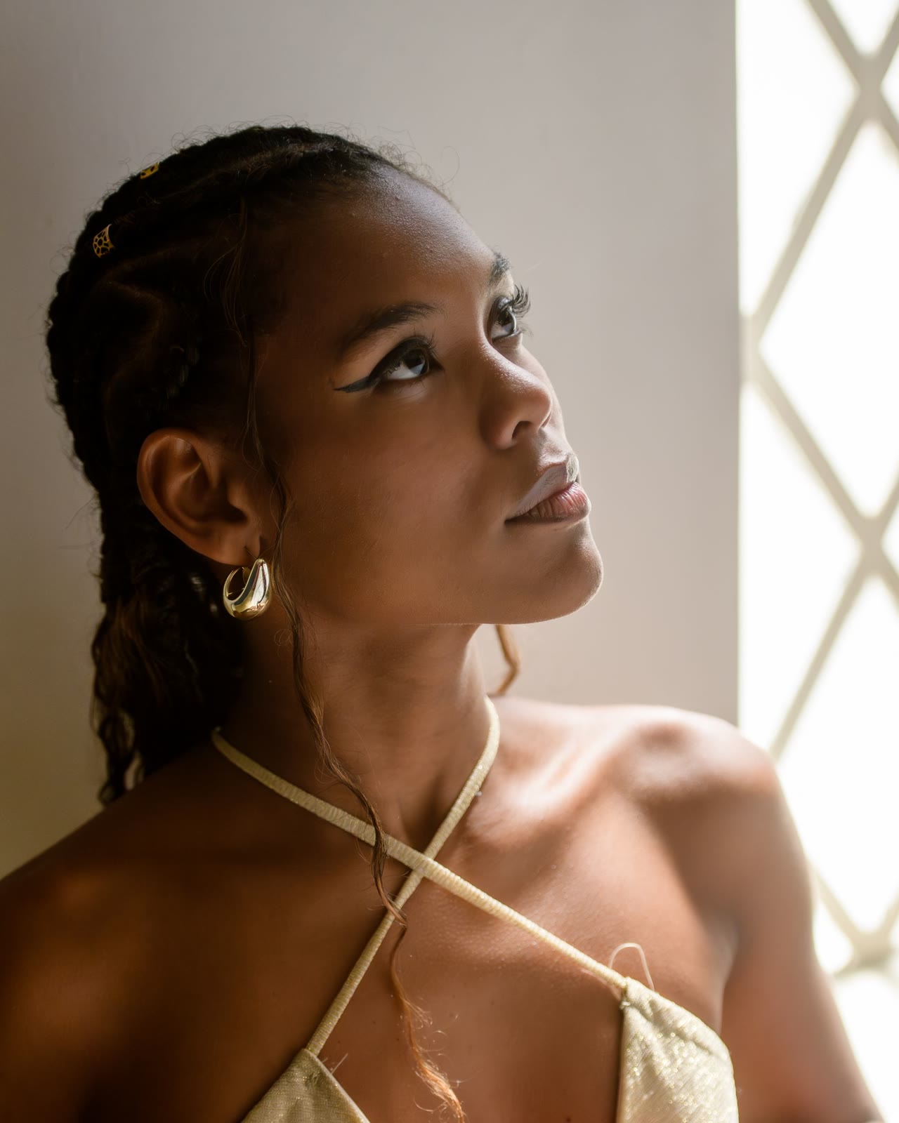 An intimate portrait of a woman in soft natural light.